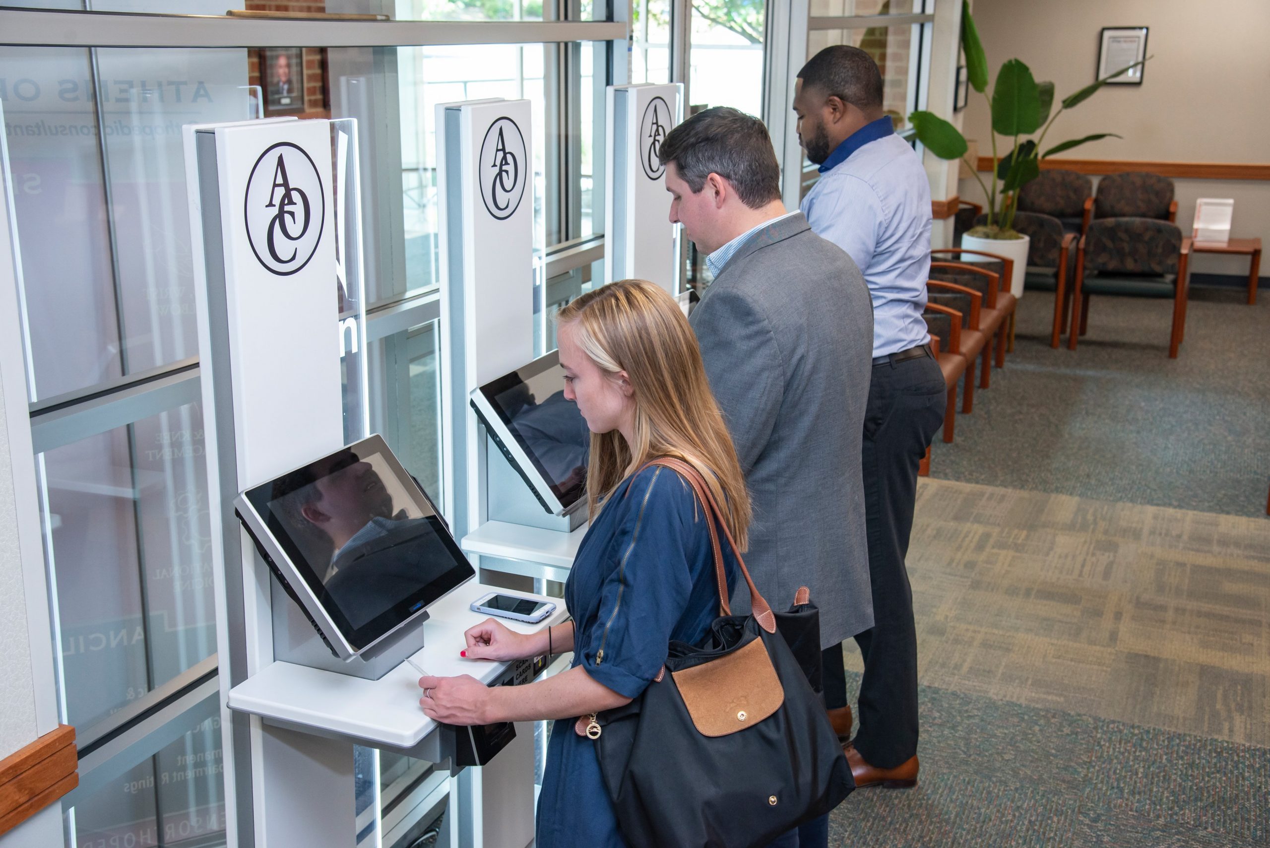 Ophthalmology patients utilizing Clearwave's self check in kiosk technology