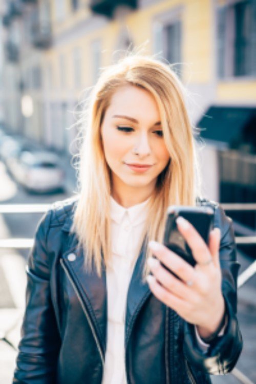 Someone checking in on their phone using Clearwave mobile check-in