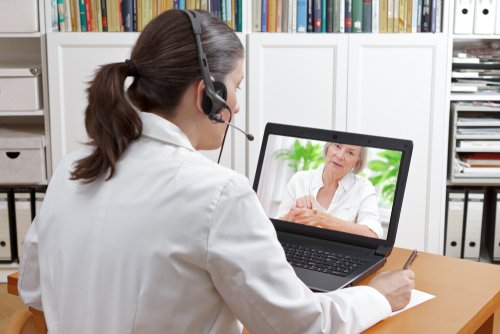 woman using telehealth