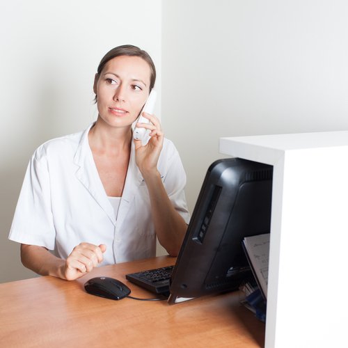 woman on phone at office 