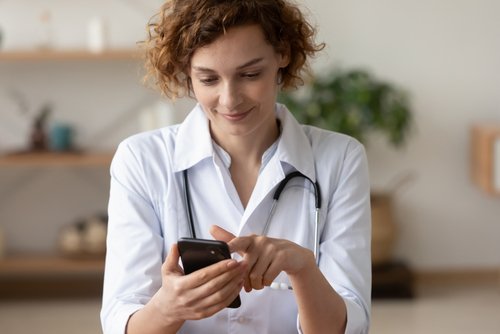 woman using cell phone for medical information