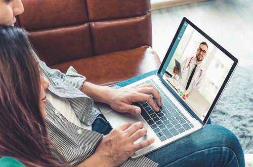 family using telehealth